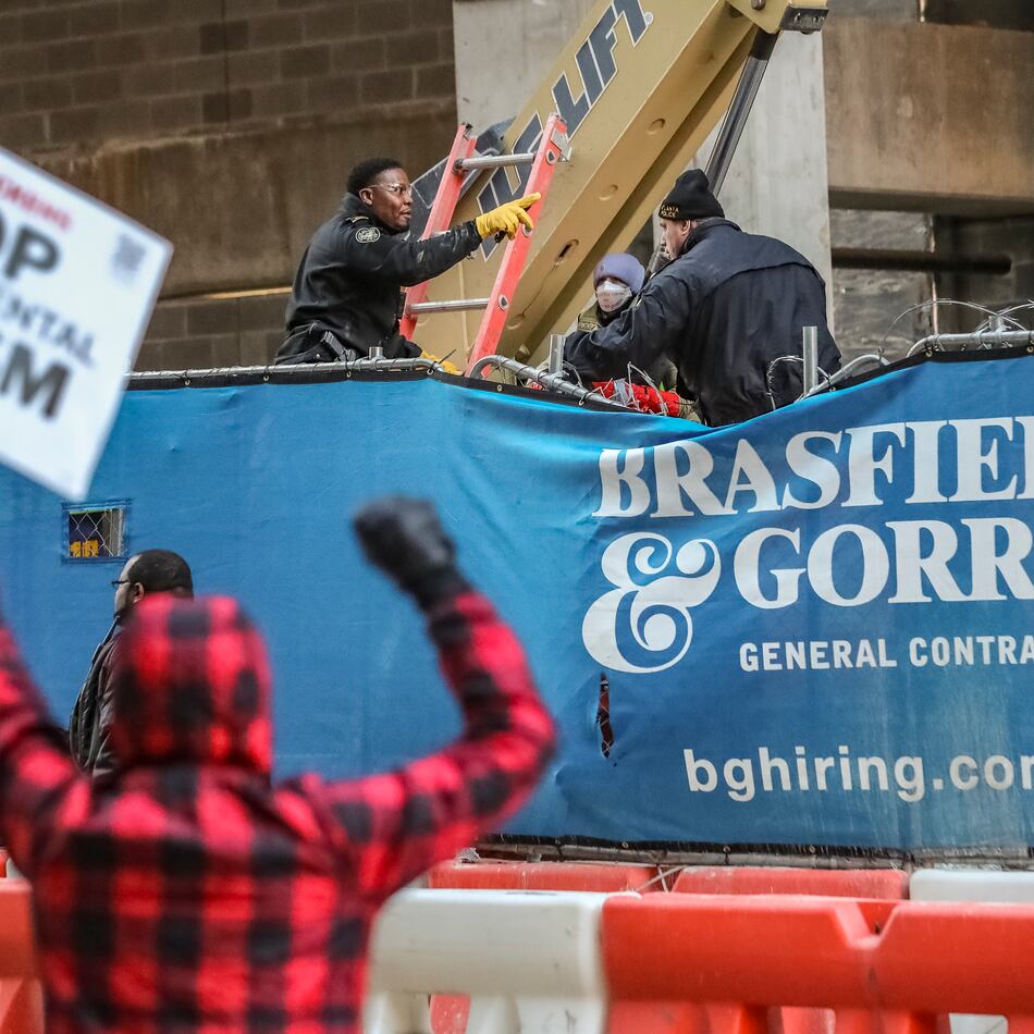 Protesters rally against Atlanta’s Public Safety Training Center at a Midtown construction site. Three people accused of trying to set fire to the Cobb office of Brasfield & Gorrie had their charges dismissed Wednesday. (John Spink/AJC 2024)