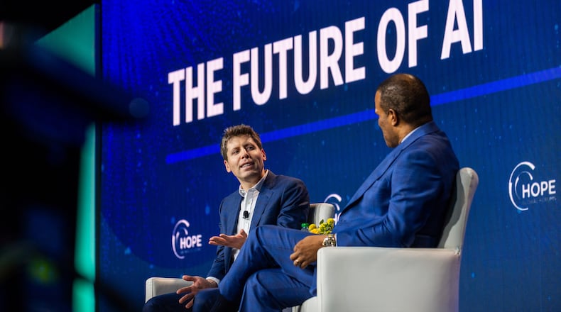 231211 ATLANTA, GA — From left, OpenAI CEO Sam Altman and founder and CEO of Operation HOPE John Hope Bryant speak at the HOPE Global Forums at the Hyatt Regency in downtown Atlanta on Monday, Dec. 11, 2023.
(Bita Honarvar for The Atlanta Journal-Constitution)