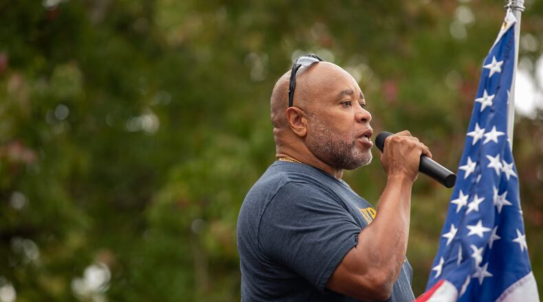 Gwinnett County Sheriff Keybo Taylor, pictured as a candidate at a get-out-the-vote rally, said he canceled a bond company's ability to operate in the county because of dishonesty regarding a GBI investigation and not a failed extortion attempt. (Rebecca Wright for the Atlanta Journal-Constitution) AJC FILE PHOTO