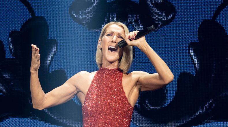 FILE - Singer Celine Dion performs during her first World Tour show called Courage at the Videotron Centre on Sept. 18, 2019, in Quebec City. (Jacques Boissinot/The Canadian Press via AP, File)