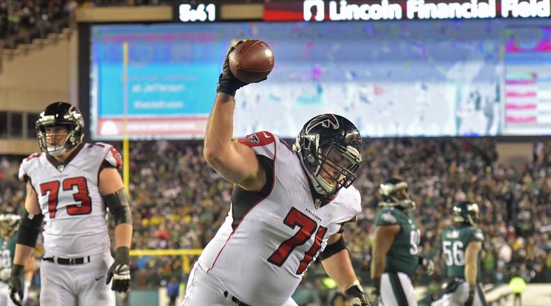 January 13, 2018 Philadelphia, PA - Atlanta Falcons offensive guard Wes Schweitzer (71) celebrates after Atlanta Falcons running back Devonta Freeman (24) scored a touchdown in the first half during the NFC Divisional Game at Lincoln Financial Field in Philadelphia, PA on Saturday, January 13, 2018. HYOSUB SHIN / HSHIN@AJC.COM