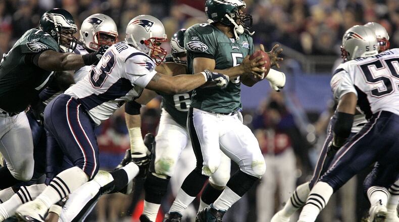 Defensive tackle Richard Seymour harasses Donovan McNabb of the Eagles in Super Bowl 39. (Photo by Brian Bahr/Getty Images)