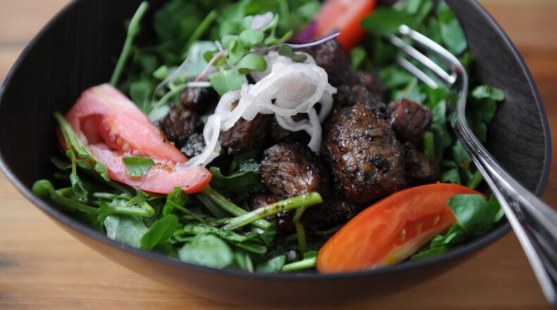 Bo Luc Lac Shaking Beef at Ba Bellies in Norcross. (BECKY STEIN PHOTOGRAPHY)