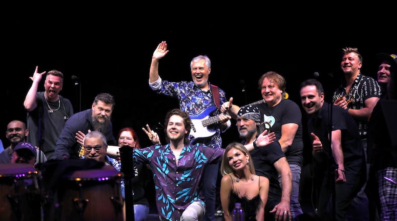 Leonid & Friends founder Leonid Vorobyev and son, band manager Roman (both center) finish the show with a band selfie for their crowd.
(Courtesy of Reed Galin)