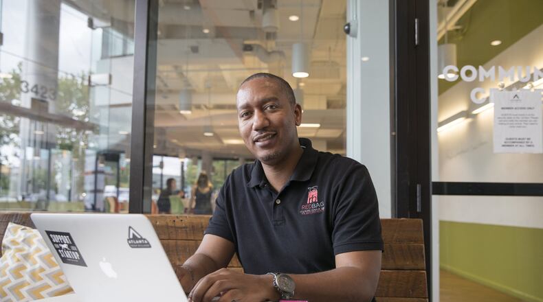 When U.S. Army veteran John Thomas left active duty, he had trouble finding a job. He went through a program with Workforce Opportunity Services and worked with WOS corporate partner Hewlett-Packard. He now runs his own company, RedBag Gifts. ALYSSA POINTER/ALYSSA.POINTER@AJC.COM