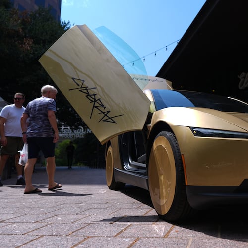A Tesla Cybercab is displayed in downtown Austin, Texas, Thursday, Sept. 3, 2026. (AP Photo/Eric Gay)