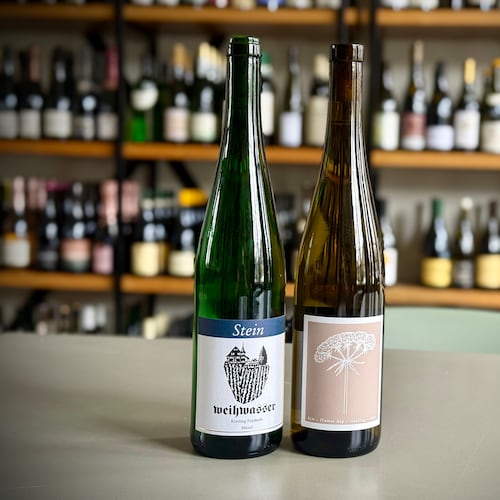 Two riesling wines in the loosely defined feinherb style, one from German producer Stein and another from New York winemaker Hermann J. Wiemer. (Krista Slater for the AJC)