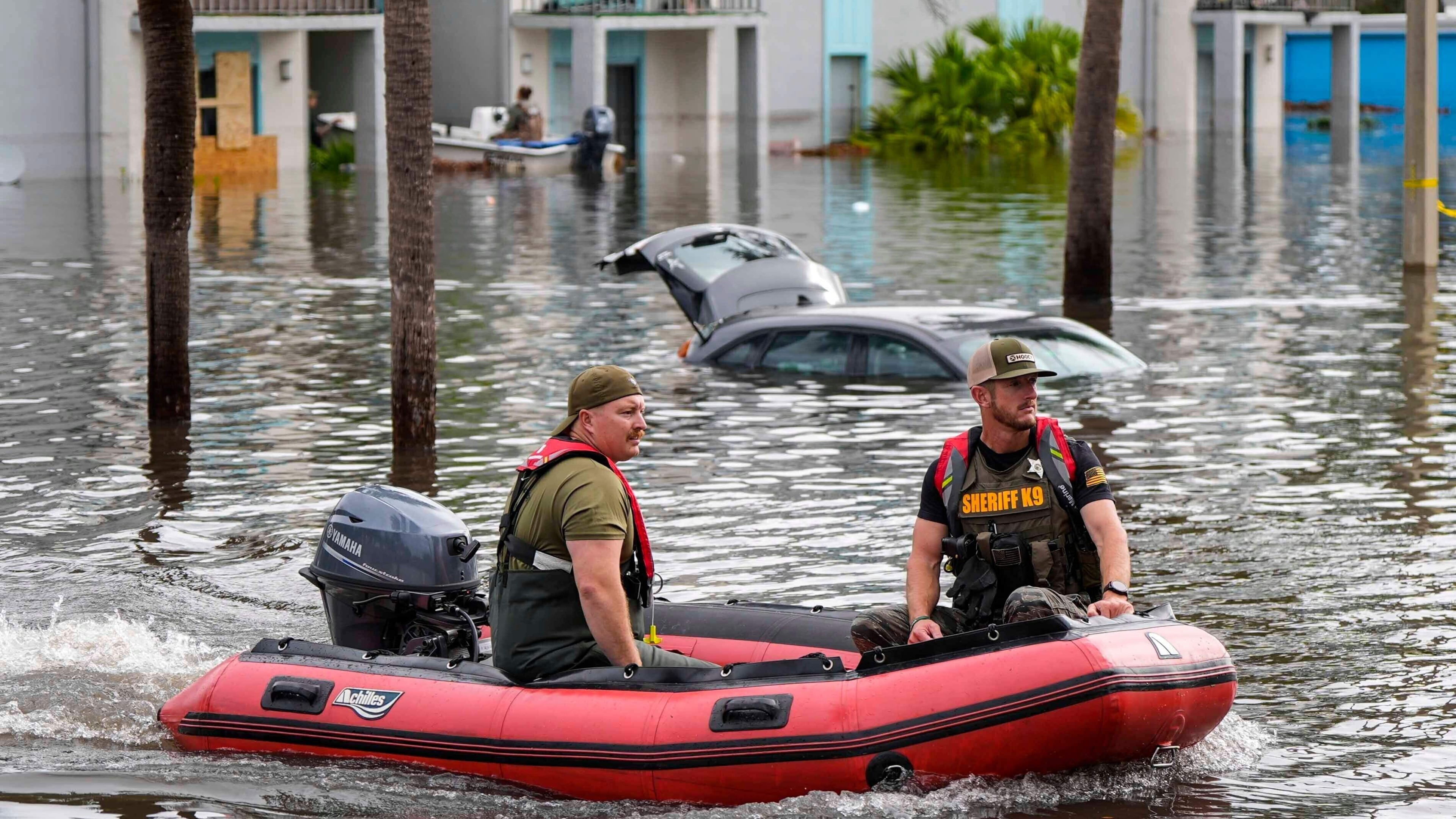 FILE - A water rescue boat moves in floodwaters at an apartment complex in the aftermath of Hurricane Milton, Oct. 10, 2024, in Clearwater, Fla. (AP Photo/Mike Stewart, File)