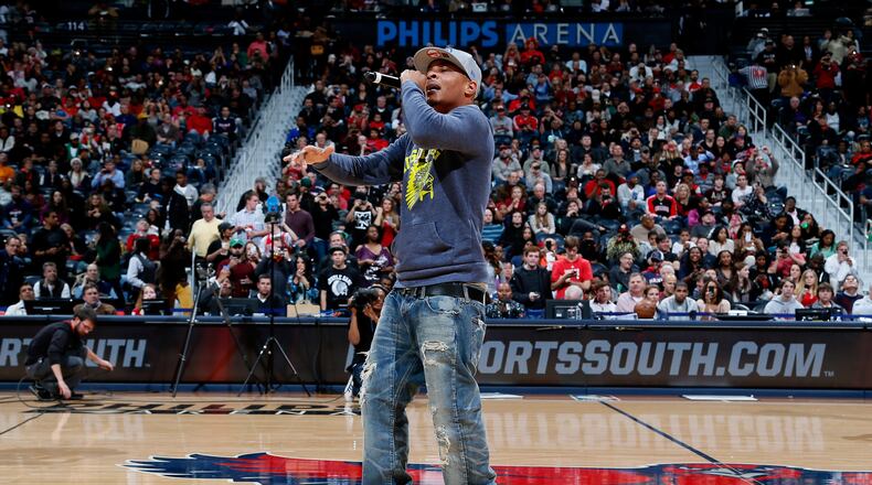 ATLANTA, GA - DECEMBER 22: Rapper T.I. performs at halftime of the game between the Atlanta Hawks and the Chicago Bulls at Philips Arena on December 22, 2012 in Atlanta, Georgia. NOTE TO USER: User expressly acknowledges and agrees that, by downloading and or using this photograph, User is consenting to the terms and conditions of the Getty Images License Agreement. (Photo by Kevin C. Cox/Getty Images)