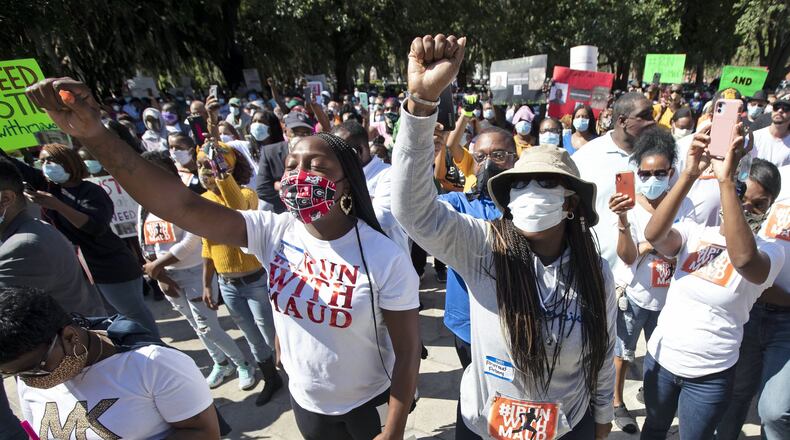 People held rally to protest the fatal shooting of Ahmaud Arbery on Friday, May 8, 2020, in Brunswick Ga. Two men have been charged with murder in the February shooting. (AP Photo/John Bazemore)
