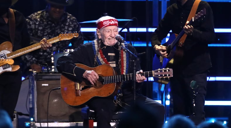 Under doctor's orders, Willie Nelson won't perform at Ameris Bank Amphitheatre for the kickoff of his Outlaw Music Festival tour. He's seen here at the Rock & Roll Hall of Fame Induction Ceremony on Friday, Nov. 3, 2023, at Barclays Center in New York. (Photo by Andy Kropa/Invision/AP)