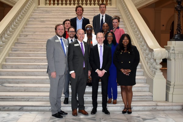 State Rep. Bill Werkheiser stands with staff members from the Southern Center for Human Rights and the Georgia Association of Criminal Defense Lawyers on Tuesday after his bill aimed at keeping intellectually disabled people off death row was signed into law.