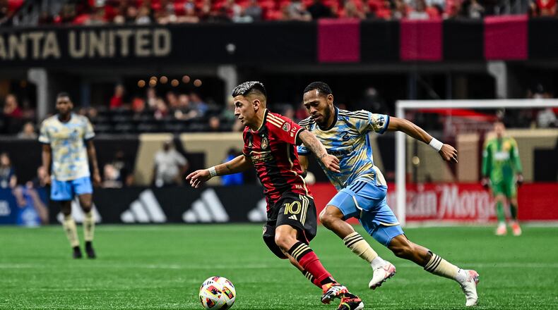 Atlanta United midfielder Thiago Almada #10 dribbles the ball during the match against Philadelphia Union at Mercedes-Benz Stadium in Atlanta, GA on Sunday April 14, 2024. (Photo by Madelaina Polk/Atlanta United)
