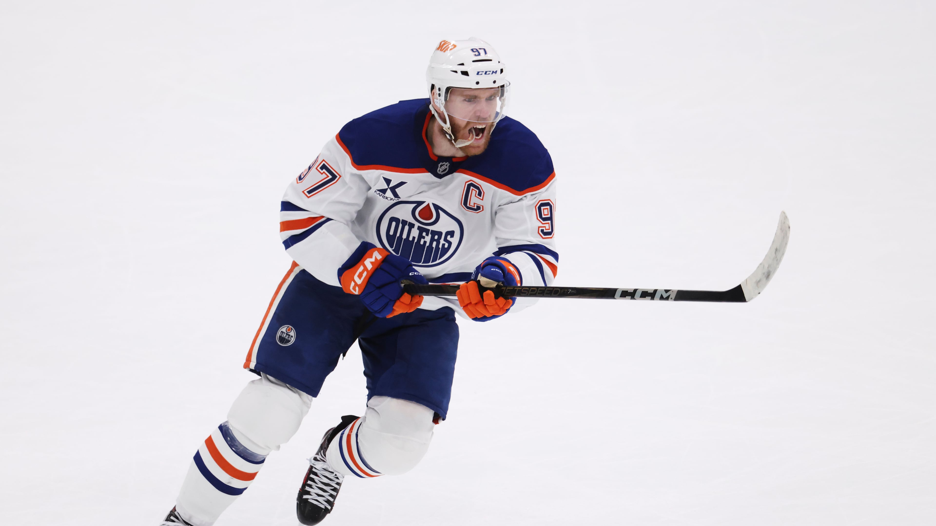 FILE - Edmonton Oilers center Connor McDavid celebrates after scoring against the Dallas Stars during the second period of Game 5 of the Western Conference finals in the NHL hockey Stanley Cup playoffs, May 29, 2025, in Dallas. (AP Photo/Gareth Patterson, file)
