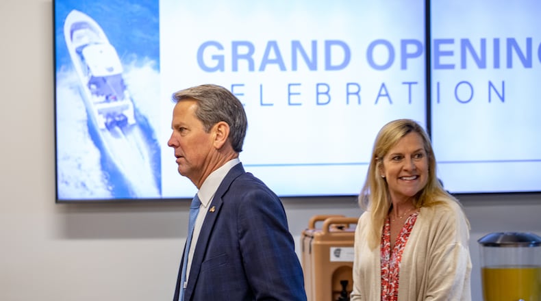 Governor Brian Kemp and Marty Kemp take a quick tour  before the grand opening of the new Yamaha Marine Innovation Center in Kennesaw on Wednesday, April 12, 2023.  The facility is dedicated to creating the next generation in outdoor sport connected technology and is specifically recruiting local university students for engineering and technical jobs.  (Jenni Girtman for The Atlanta Journal-Constitution)