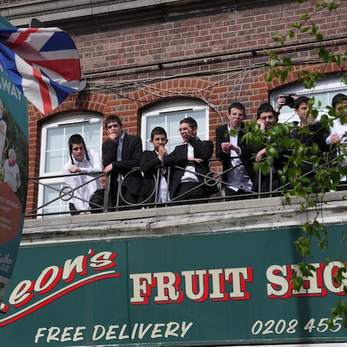 People look over the area where two people were stabbed in Golders Green neighbourhood, that has a large Jewish community, in London, Wednesday, April 29, 2026.(AP Photo/Kin Cheung)
