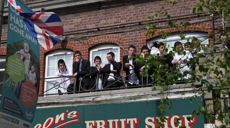 People look over the area where two people were stabbed in Golders Green neighbourhood, that has a large Jewish community, in London, Wednesday, April 29, 2026.(AP Photo/Kin Cheung)