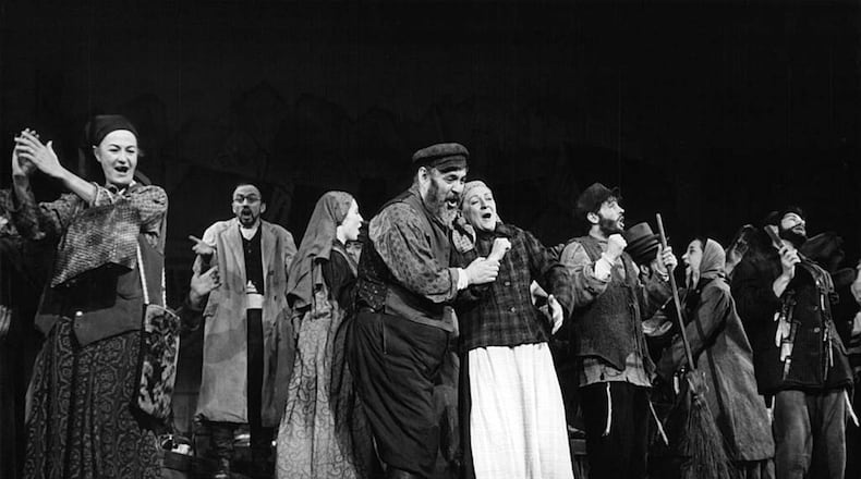 Zero Mostel and Maria Karnilova in a scene from a stage play “Fiddler On The Roof,” 1964. Michael Ochs Archives/Moviepix/Getty Images