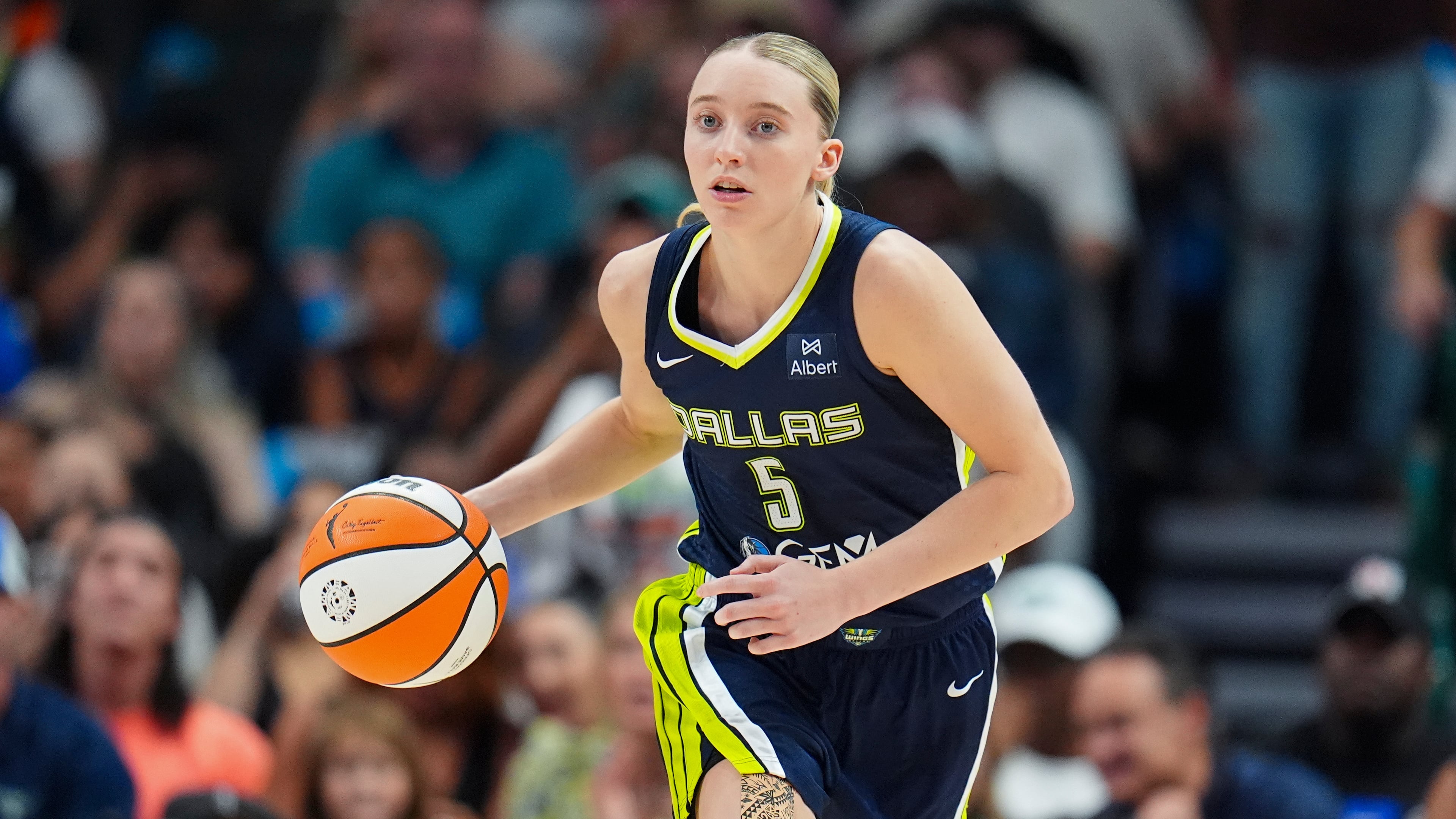 FILE - Dallas Wings guard Paige Bueckers dribbles up court against the Indiana Fever during the second half of a WNBA basketball game Friday, Aug. 1, 2025, in Dallas. (AP Photo/Julio Cortez, File)