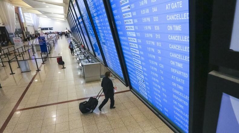 September 11, 2017 Atlanta: Delta Air Lines canceled 900 flights as tropical storm Irma made its way towards Atlanta. JOHN SPINK/JSPINK@AJC.COM