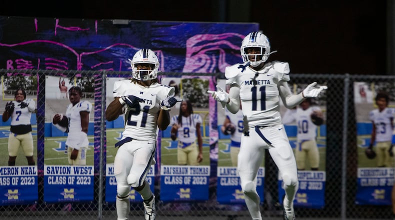 Marietta players celebrate a touchdown in a 2022 game. CHRISTINA MATACOTTA FOR THE ATLANTA JOURNAL-CONSTITUTION.