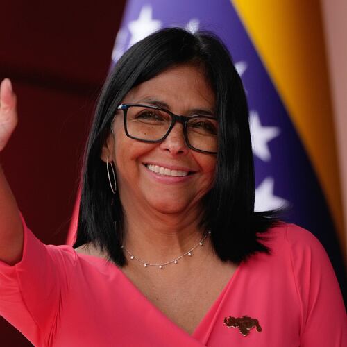 FILE - Venezuela's acting President Delcy Rodriguez waves as she waits for Colombian President Gustavo Petro at Miraflores Palace in Caracas, Venezuela, Friday, April 24, 2026. (AP Photo/Ariana Cubillos, File)