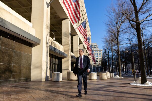 Outgoing FBI Director Christopher Wray walks outside the J. Edgar Hoover Building for an interview with the AJC in Washington, D.C., on Sunday, Jan. 12, 2025. Arvin Temkar/AJC