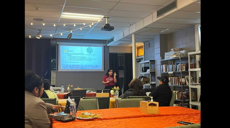 Stephanie Contreras, the Health Navigation and Social Services Manager for the immigrant rights group, CASA, speaks at a know your rights workshop Escuelitas on Buford Highway conducted in partnership with CASA and the Georgia Latino Alliance for Human Rights. Photo Credit: Escuelitas on Buford Highway.