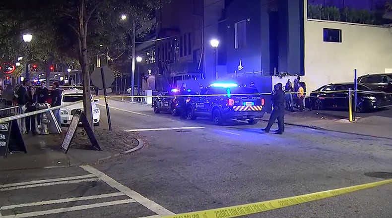 A 21-year-old man was taken into custody by officers working a “city approved extra job” early Sunday following a deadly shooting along Crescent Avenue in Midtown, police said.