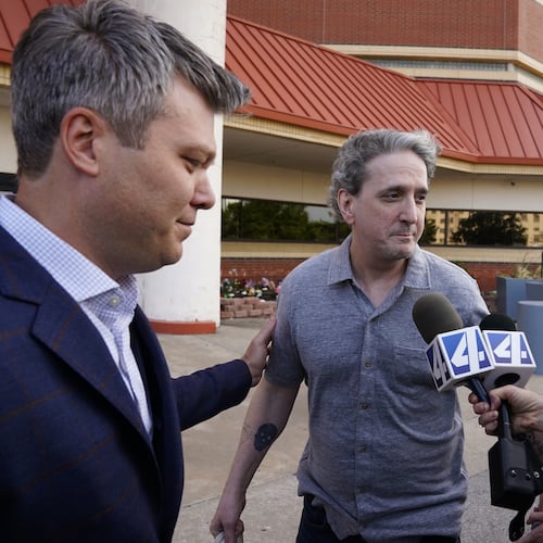 Former death row prisoner Richard Glossip, center, speaks to media after exiting a detention facility after being granted bond while awaiting retrial Thursday, May 14, 2026, in Oklahoma City. (AP Photo/Nick Oxford)