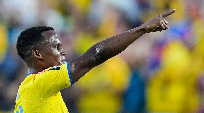 Colombia's Jhon Arias (11) reacts after scoring his team's first goal during the World Cup round of 32 soccer match between Colombia and Ghana in Kansas City, Mo., Friday, July 3, 2026. (AP Photo/Charlie Riedel)