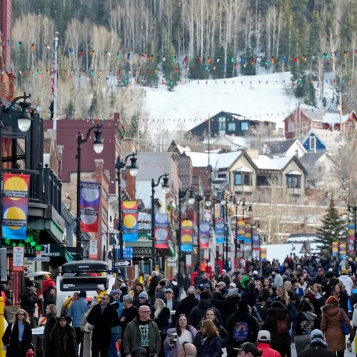 Pedestrians walk down Main Street on the first day of the 2026 Sundance Film Festival on Thursday, Jan. 22, 2026, in Park City, Utah. (Photo by Charles Sykes/Invision/AP)