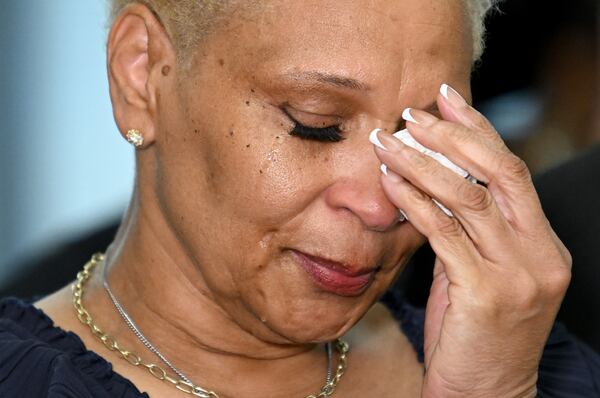 Jonia Milburn, mother of Christon Collins, can’t hide her emotions as she speaks to members of the press during a press conference on Tuesday, Aug. 6, 2024, in Atlanta. The family of Christon Collins held a press conference with attorney Ben Crump. Collins, a veteran, was found dead in the DeKalb County Jail on March 13. (Hyosub Shin/AJC)