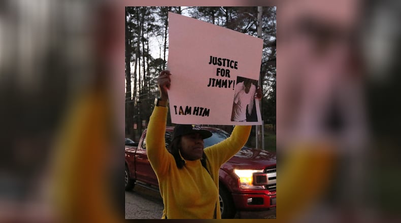 3/19/19 - Atlanta  - Yomazda Longwolf protests the way the death of 21-year-old Jimmy Atchison was handled by officials outside of a town hall hosted by Atlanta Mayor Keisha Lance Bottoms at Cascade United Methodist Church in Atlanta, Georgia on Tuesday, March 19, 2019. EMILY HANEY / emily.haney@ajc.com