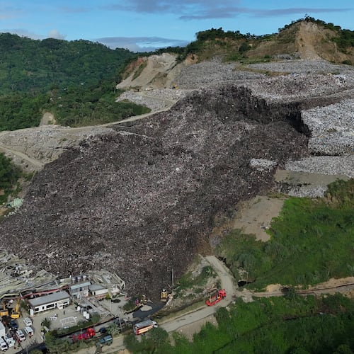 An aerial view of a huge mound of garbage that collapsed at a waste segregation facility in Binaliw, Cebu city on Friday, Jan. 9, 2026. (AP Photo/Jacqueline Hernandez)