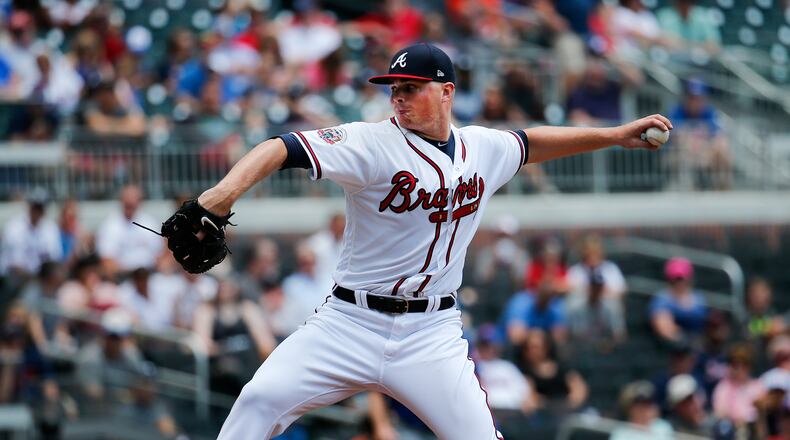 Atlanta Braves starting pitcher Sean Newcomb throws in the fifth inning of a baseball game against the New York Mets Saturday, June 10, 2017, in Atlanta. Newcomb was making his Major League debut. New York won 6-1 in the first game of a double header. (AP Photo/John Bazemore)