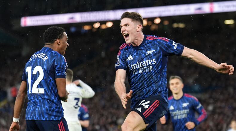 Arsenal's Viktor Gyokeres, right, celebrates scoring his side's third goal of the game with team-mate Jurrien Timber during the English Premier League soccer match between Leeds United and Arsenal in Leeds, England, Saturday, Jan. 31, 2026. (Mike Egerton/PA via AP)