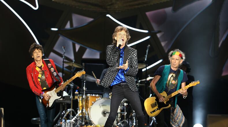 AUCKLAND, NEW ZEALAND - NOVEMBER 22: Ronnie Wood (L) Mick Jagger (C) and Keith Richards (R) on stage as The Rolling Stones perform live at Mt Smart Stadium on November 22, 2014 in Auckland, New Zealand. (Photo by Fiona Goodall/Getty Images) The Rolling Stones in New Zealand last fall. Photo: Getty Images.