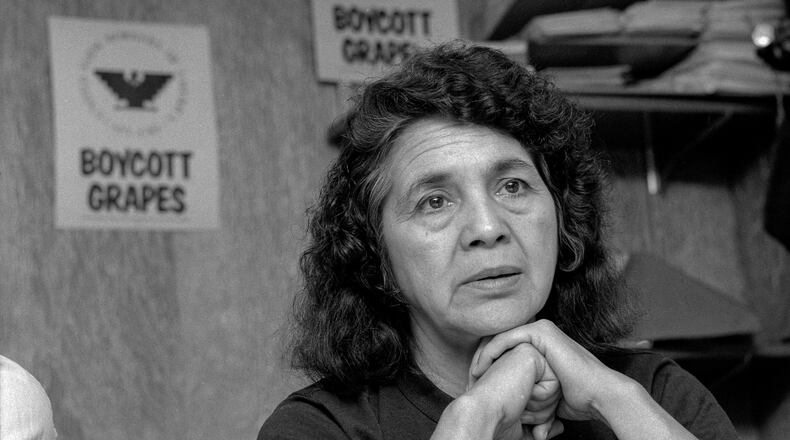 United Farm Workers leader Dolores Huerta sits in the UFW headquarters in San Francisco on March 8, 1989, as she awaits results from a San Francisco Police Commission hearing about the alleged beating of Huerta at a rally in September the previous year. (Mike Maloney/San Francisco Chronicle via AP)
