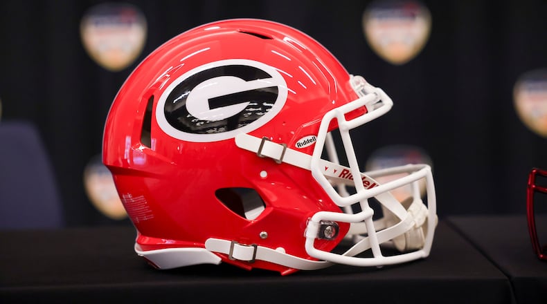 The football helmet of Georgia is shown before the head coaches' joint news conference at the Le Meridien Dania Beach Hotel, on Dec., 29, 2023, in Fort Lauderdale, Florida. (Jason Getz/The Atlanta Journal-Constitution/TNS)