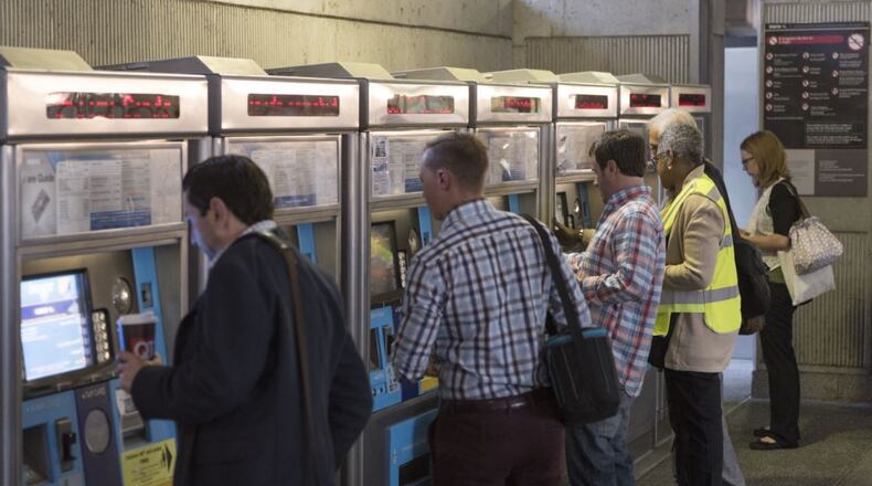 Commuters purchase rides at Breeze Card stations at North Springs MARTA Station in Atlanta, Georgia, on Monday, April 10, 2017. MARTA trains have been busy since the March 30 collapse of a section of I-85. But President Trump’s proposed budget could jeopardize MARTA expansion plans. (DAVID BARNES/DAVID.BARNES@AJC.COM)