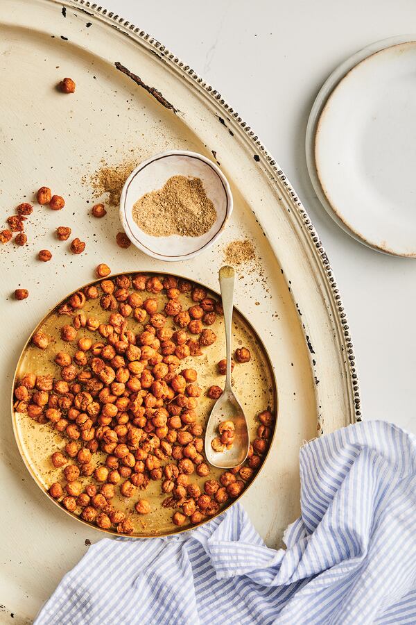 These seasoned roasted chickpeas can be eaten as a snack or added to salads. (Courtesy of Adam Milliron)