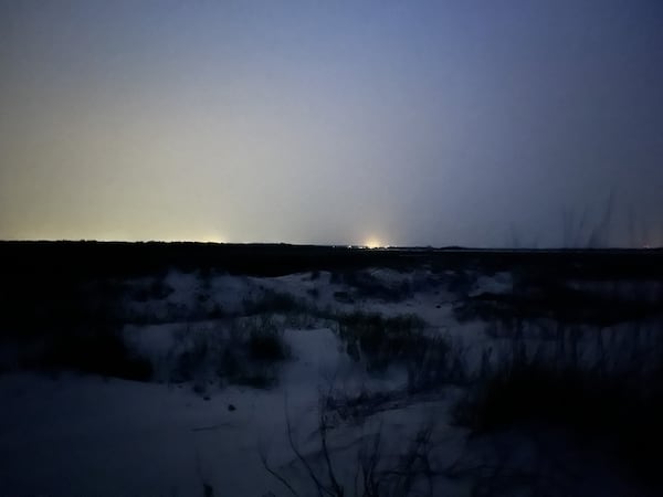 The glow from high-mast lights installed at I-95's Exit 42 can be seen from sea turtle nesting sites on Little St. Simons Island. (Courtesy of the St. Simons Island Sea Turtle Project and One Hundred Miles)