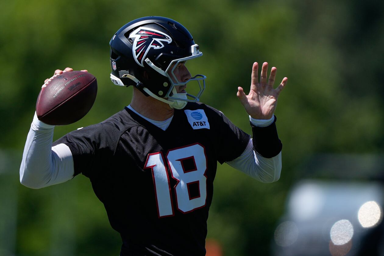 Atlanta Falcons quarterback Jack Strand (18) runs drills during an NFL football training camp practice Monday, Aug. 24, 2026, in Flowery Branch, Ga. (AP Photo/Brynn Anderson)
