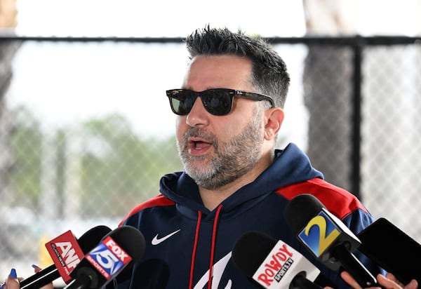 Atlanta Braves general manager Alex Anthopoulos answers questions from members of the media during spring training workouts at CoolToday Park, Friday, February 14, 2025, North Port, Florida. (Hyosub Shin / AJC)
