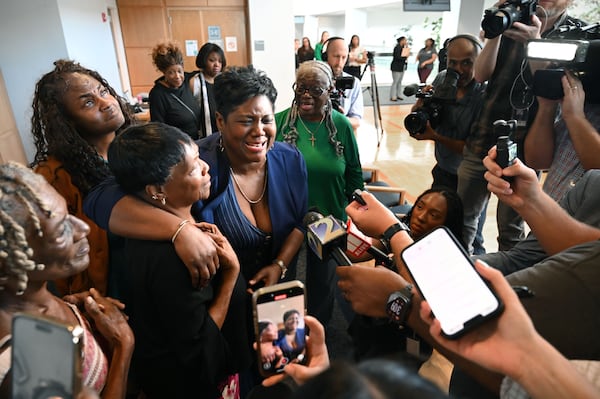 Danyel Smith’s fiancee, LaTasha Pyatt, speaks to the media at the Gwinnett County Superior Courthouse after Smith was granted bond on Tuesday, Sept. 1, 2026. (Hyosub Shin/AJC)