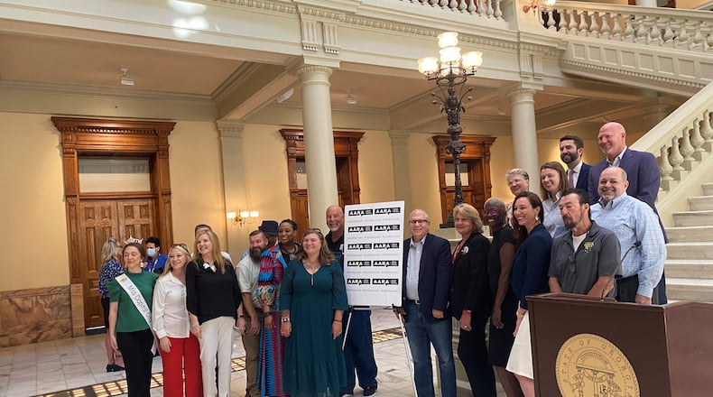 The American Addiction Recovery Association officially launched Wednesday, June 26, 2024 with a press conference and reception at the Georgia Capitol. Its CEO, Jeff Breedlove, is in the center to the right of the sign in glasses, and its president, Scott Cochran, is to the far right in the topmost row. (PHOTO by Ariel Hart / ahart@ajc.com)