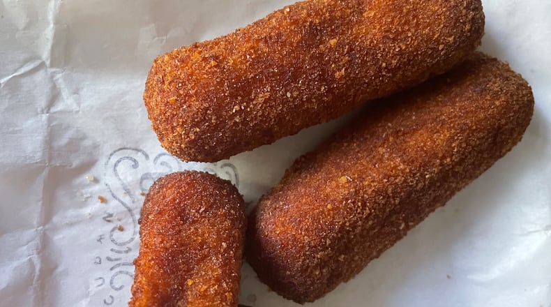 The ham croquetas at Buena Gente have dry-cured ham ground in the filling, which provides sweet, mild and salty notes. Angela Hansberger for The Atlanta Journal-Constitution