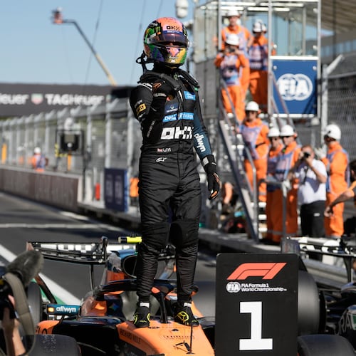 McLaren driver Lando Norris of Britain celebrates his pole position after the qualifying session for the Spanish Formula One Grand Prix in Madrid, Saturday, Sept. 12, 2026. (AP Photo/Bernat Armangue)