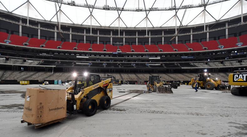 AUGUST 2, 2017 ATLANTA  Workers continue the deconstruction of the Georgia Dome, Wednesday, August 2, 2017. As workers prepare Mercedes-Benz Stadium for its opening, a much less glamorous task is under way next door. The stadium  is very different than when fans last saw it: tens of thousands of seats have been removed, utilities disconnected, some interior walls knocked down, turf removed, etc. 
The Dome is scheduled for implosion on November 20. KENT D. JOHNSON / AJC